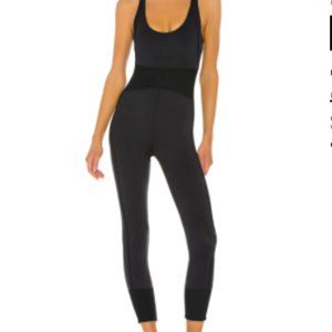 LIKE NEW X FP Movement First Place Onesie (M)